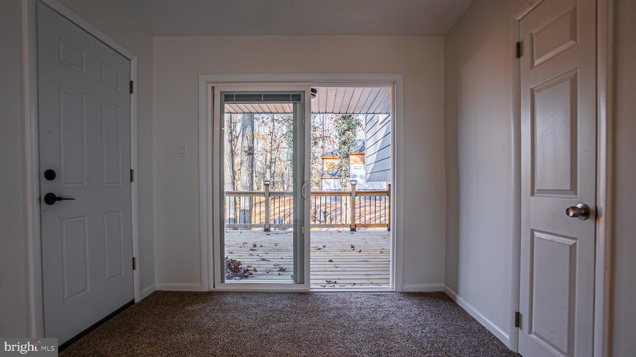 2306 Peter Cheeseman Road Sicklerville, NJ 08081 - Photo 7 of 26 a view of an empty room and window