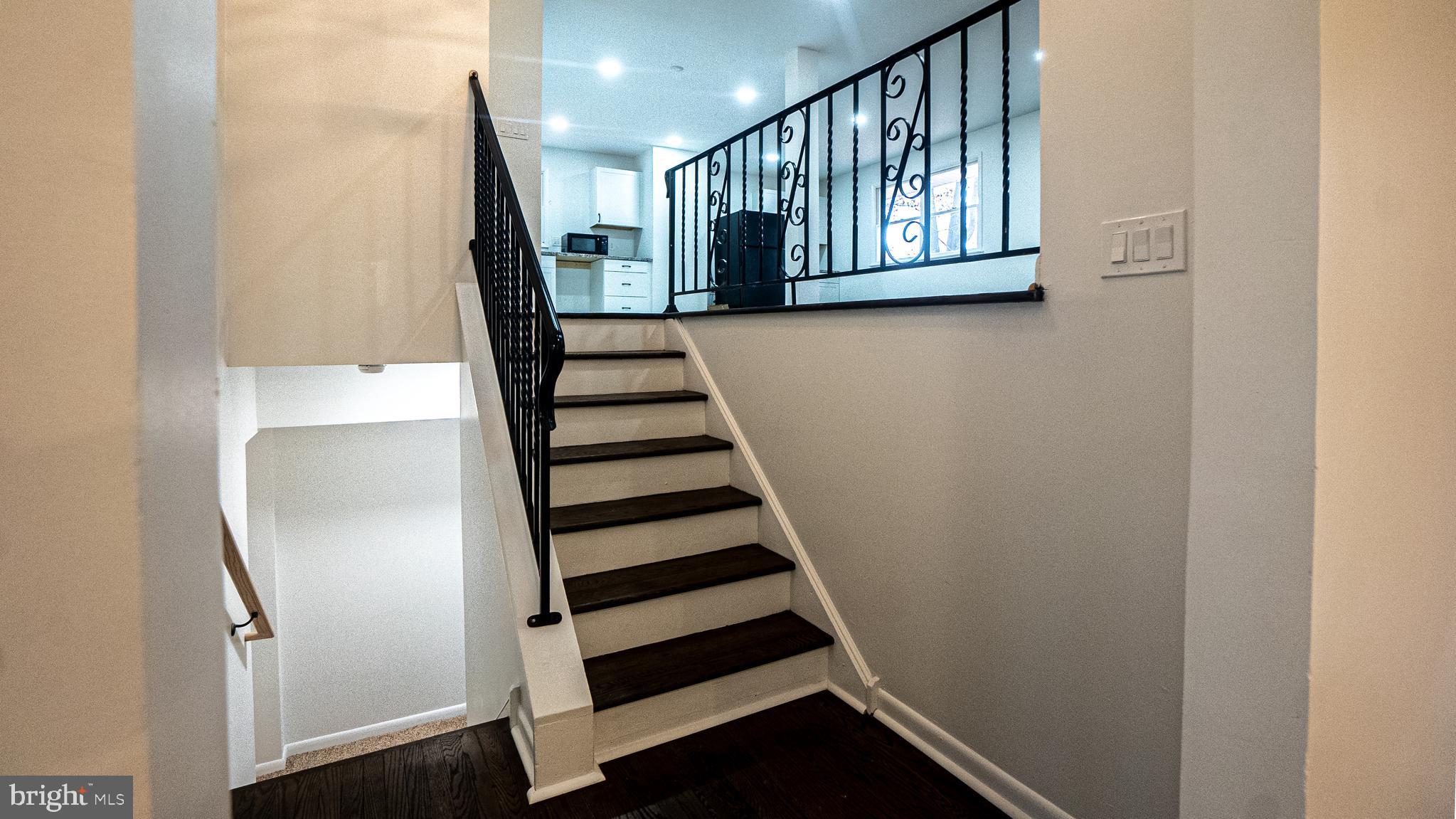 2306 Peter Cheeseman Road Sicklerville, NJ 08081 - Photo 10 of 26 a view of entryway with stairs and wooden floor