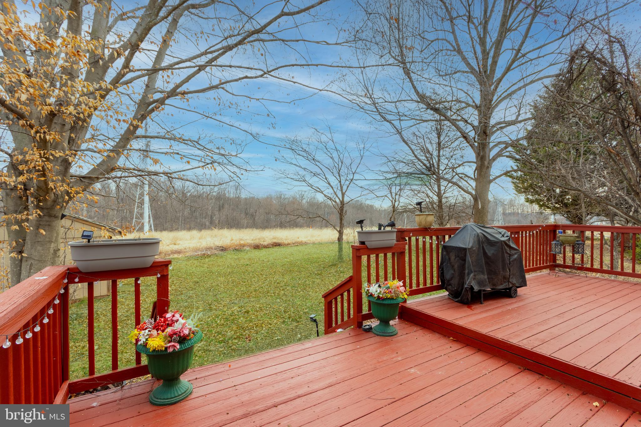 9525 Queens Guard Court Laurel, MD 20723 - Photo 31 of 36 a view of a deck with wooden floor and lake view