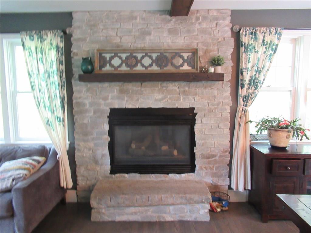 236 Mountain Road Cape Neddick, ME 03902 - Photo 14 of 28 Gas fireplace surrounded by stone. ...