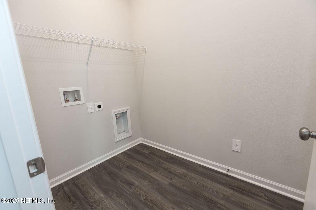 14655 Macadamia Lane Jacksonville, FL 32218 - Photo 6 of 24 a view of a room with wooden floor