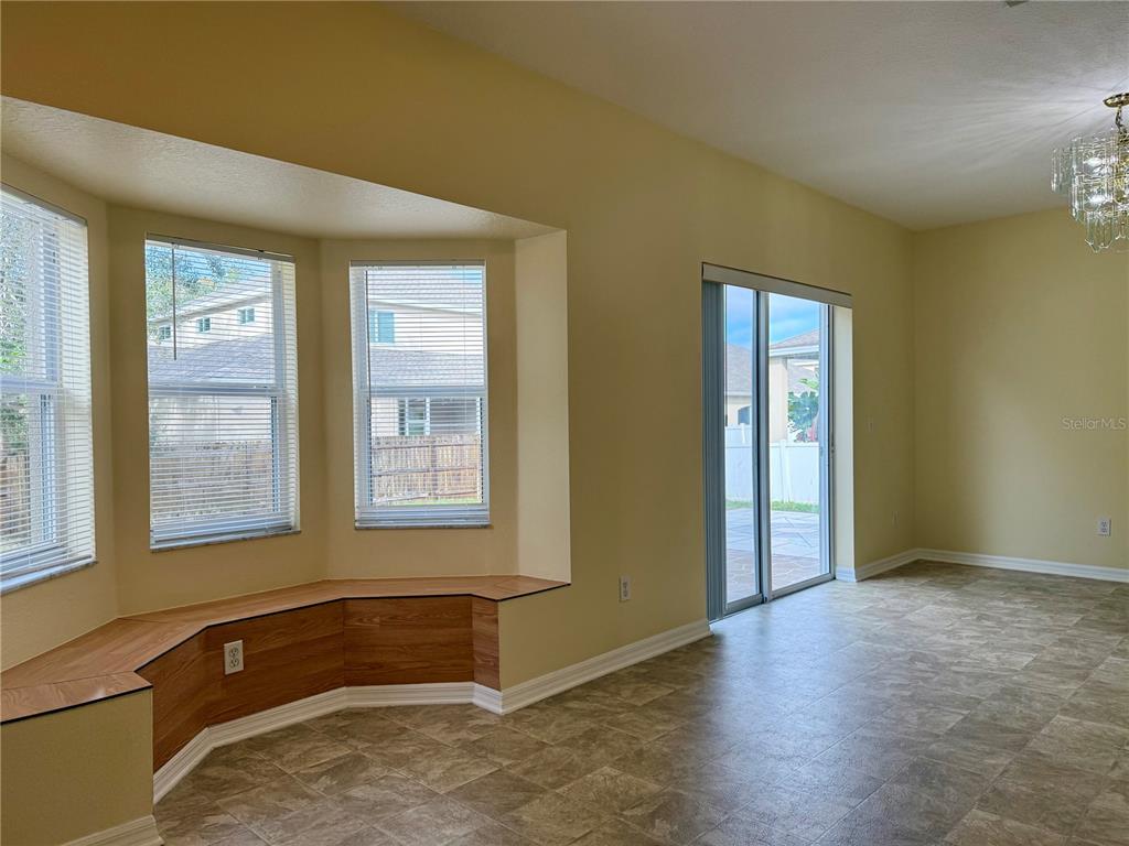 2521 Maylin Drive Trinity, FL 34655 - Photo 11 of 30 an empty room with windows