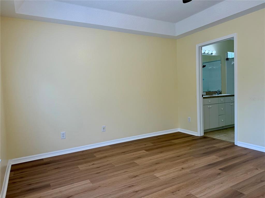 2521 Maylin Drive Trinity, FL 34655 - Photo 15 of 30 wooden floor in an empty room