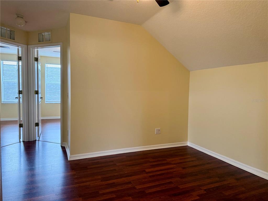 2521 Maylin Drive Trinity, FL 34655 - Photo 24 of 30 a view of a room with wooden floor