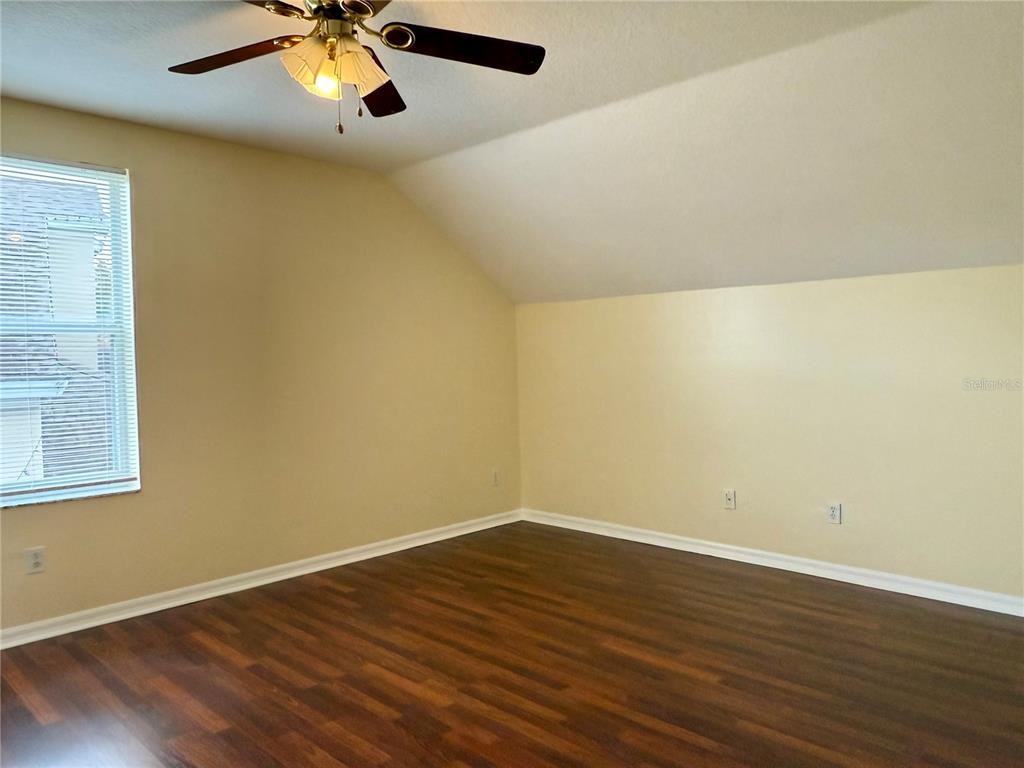 2521 Maylin Drive Trinity, FL 34655 - Photo 26 of 30 wooden floor in an empty room