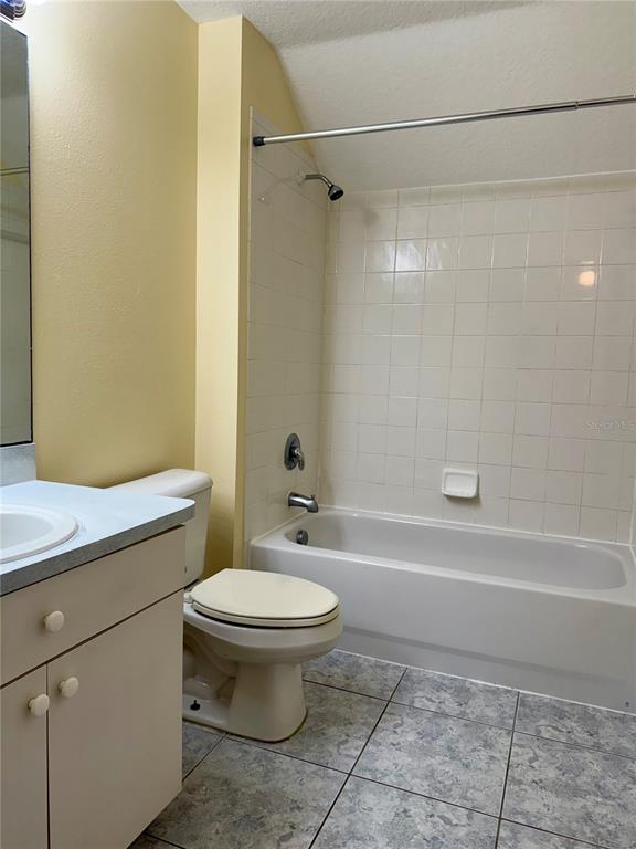 2521 Maylin Drive Trinity, FL 34655 - Photo 27 of 30 a bathroom with a sink a toilet and a bathtub