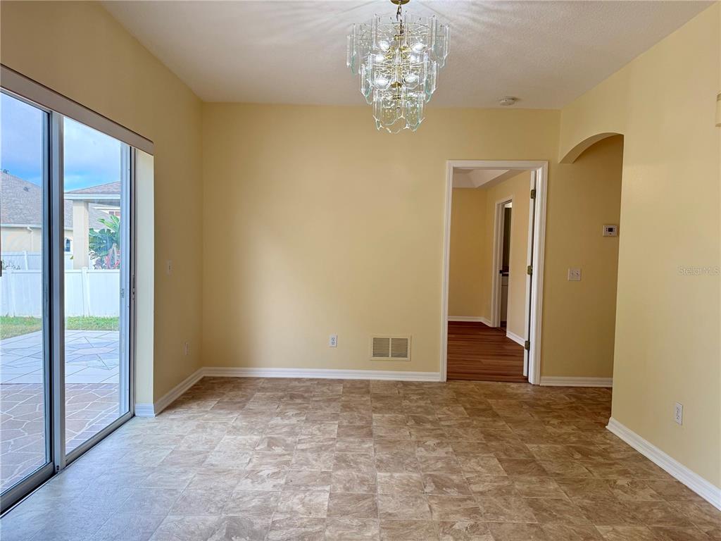 2521 Maylin Drive Trinity, FL 34655 - Photo 10 of 30 a view of a chandelier in big room and chandelier