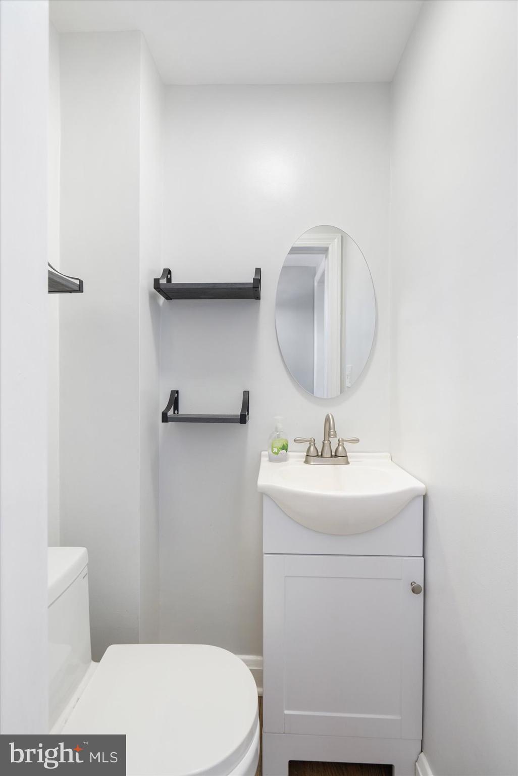 1512 Upshire Road Baltimore, MD 21218 - Photo 15 of 38 Main level half bath