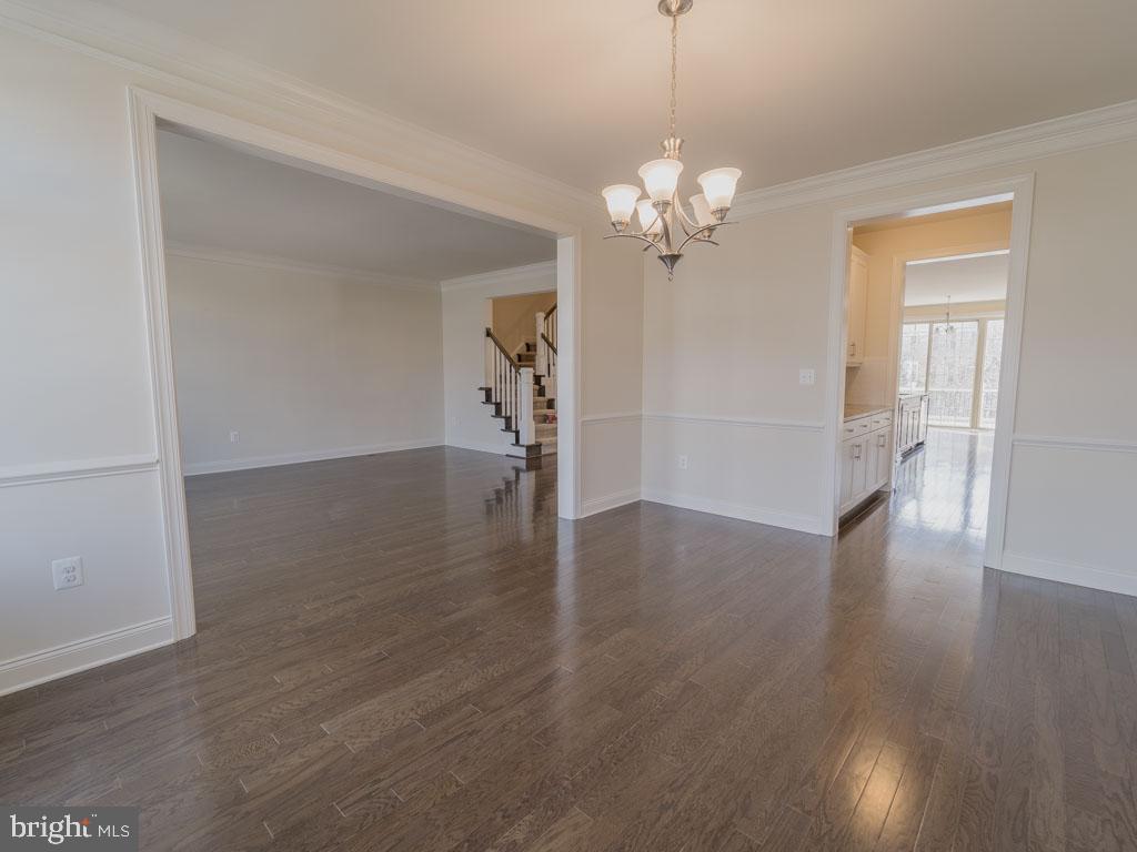 22595 Windsor Locks Square Ashburn, VA 20148 - Photo 36 of 56 a view of a livingroom with wooden floor