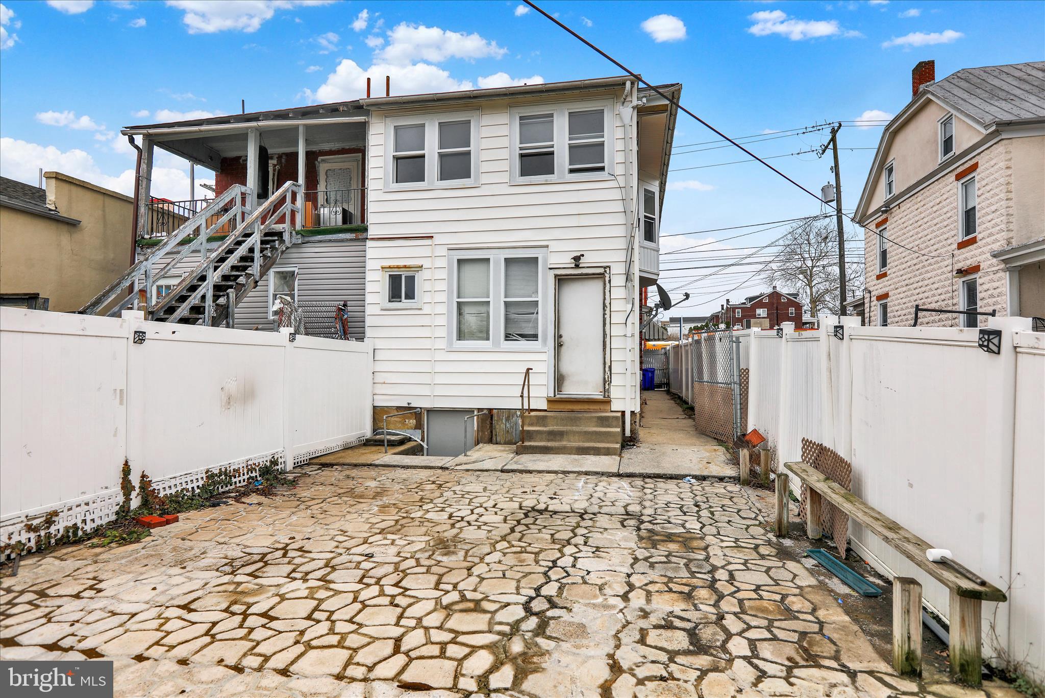 645 Lancaster Avenue Reading, PA 19611 - Photo 15 of 36 a house with trees in the background