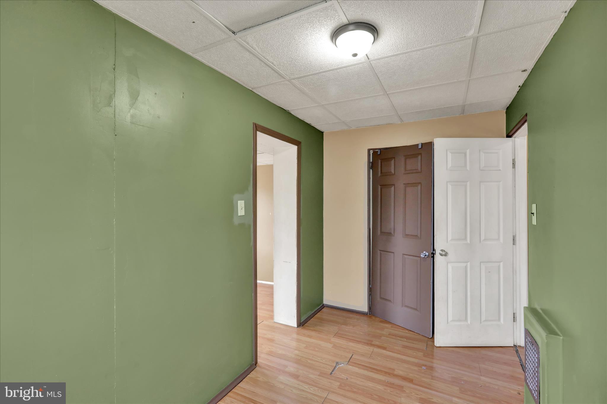645 Lancaster Avenue Reading, PA 19611 - Photo 25 of 36 an empty room with wooden floor and closet