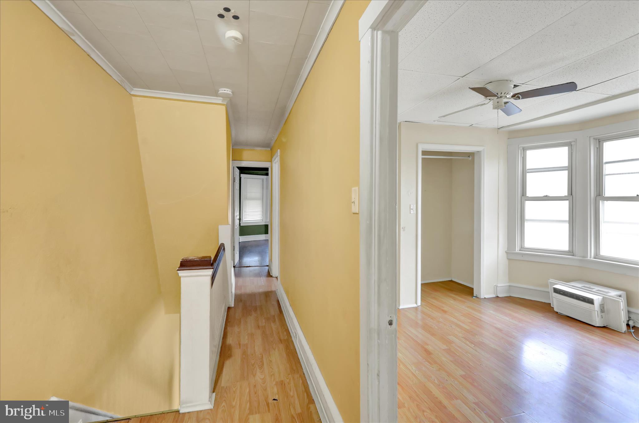 645 Lancaster Avenue Reading, PA 19611 - Photo 26 of 36 a view of a hallway with wooden floor and staircase