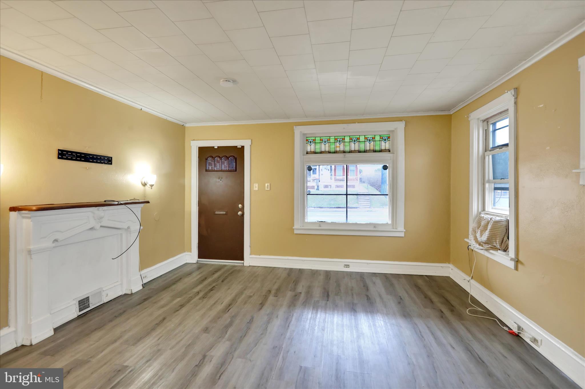 645 Lancaster Avenue Reading, PA 19611 - Photo 6 of 36 wooden floor in an empty room with a window
