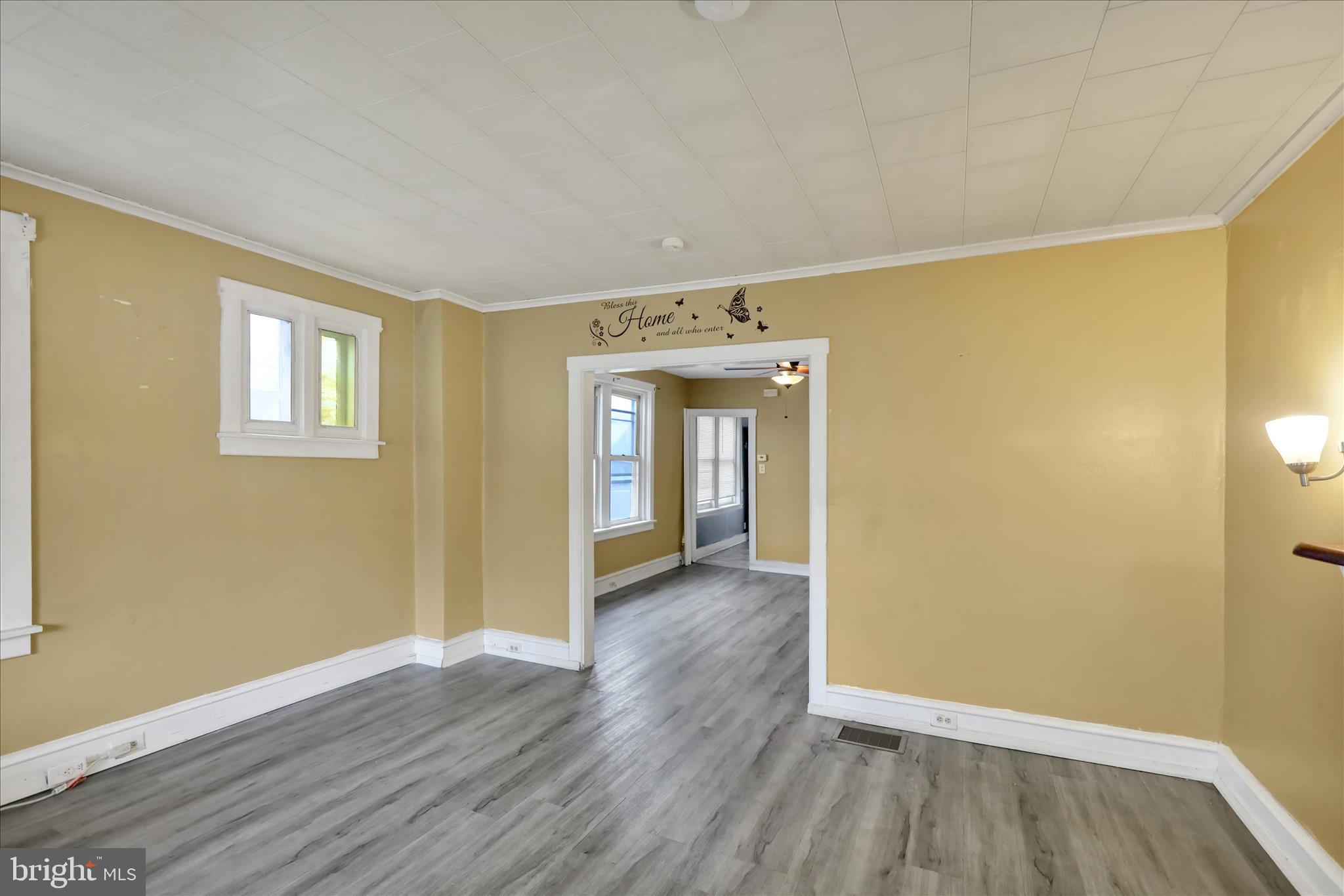 645 Lancaster Avenue Reading, PA 19611 - Photo 7 of 36 a view of an empty room with wooden floor and closet