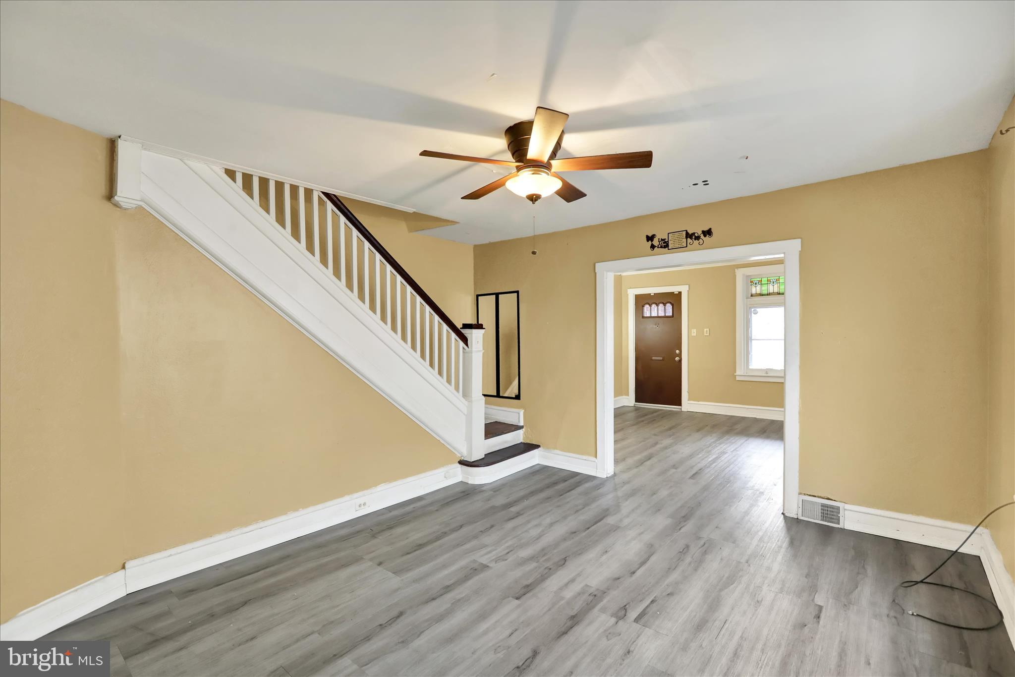 645 Lancaster Avenue Reading, PA 19611 - Photo 10 of 36 a view of an empty room with wooden floor