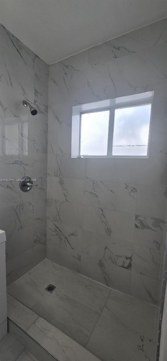 8430 Harding Avenue, Unit 4A Miami Beach, FL 33141 - Photo 14 of 43 a bathroom with a shower