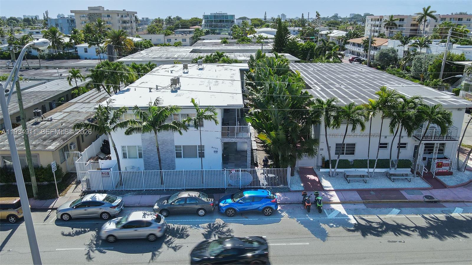 8430 Harding Avenue, Unit 4A Miami Beach, FL 33141 - Photo 36 of 43 a front view of a house with cars parked