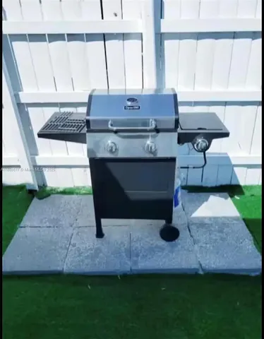 a view of outdoor space and yard