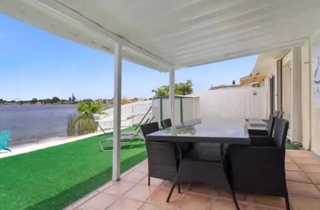 a view of an outdoor dining space with furniture