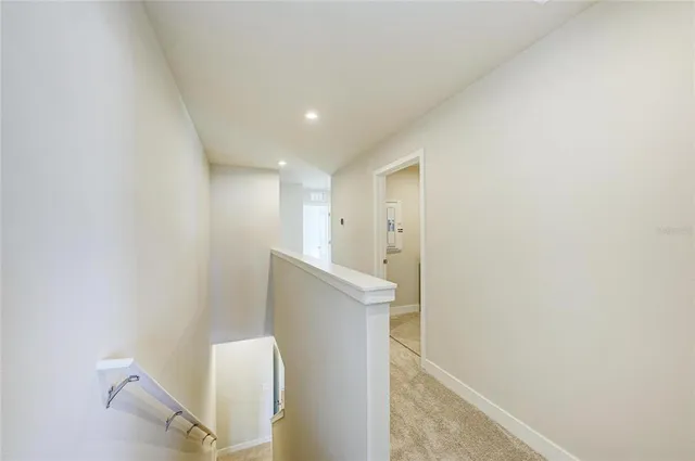 a view of hallway with stairs