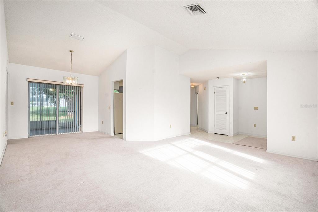 1247 Venetia Drive Spring Hill, FL 34608 - Photo 20 of 27 a view of an empty room with a window