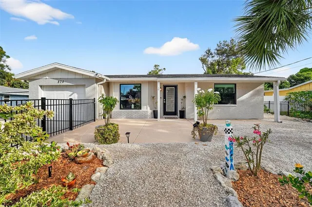 front view of a house with a patio