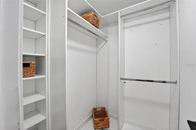 a view of hallway with walk in closet