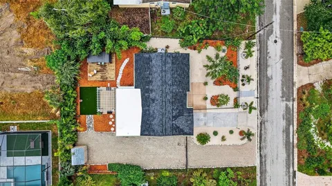 an aerial view of residential house with outdoor space