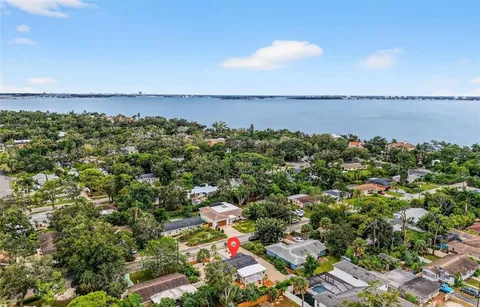 an aerial view of residential houses and city street