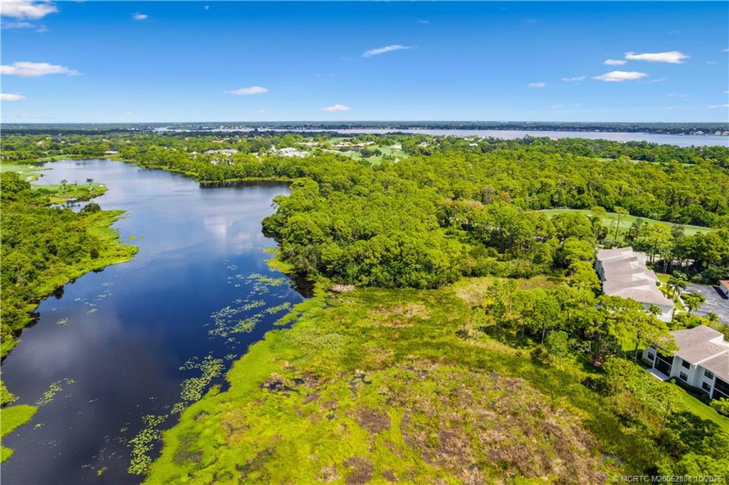 13468 Northwest Harbour Ridge Boulevard, Unit 2A Palm City, FL 34990 - Photo 29 of 38 a view of a lake
