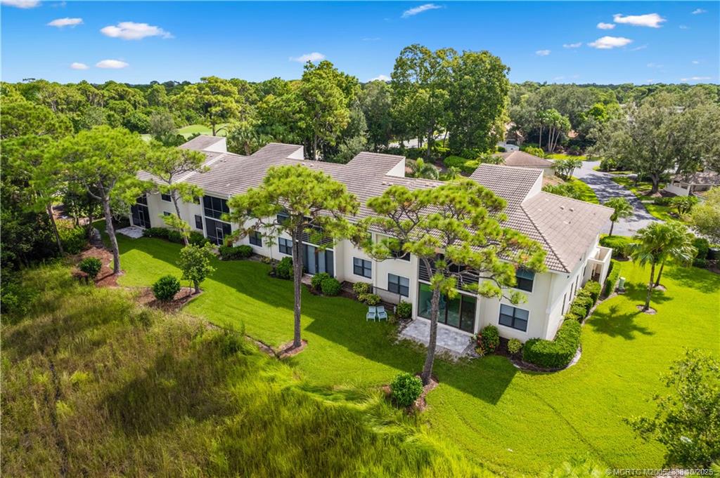 13468 Northwest Harbour Ridge Boulevard, Unit 2A Palm City, FL 34990 - Photo 34 of 38 a view of a garden