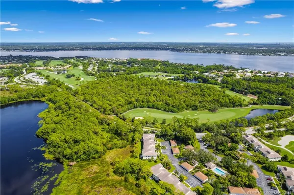 a view of a garage with a backyard
