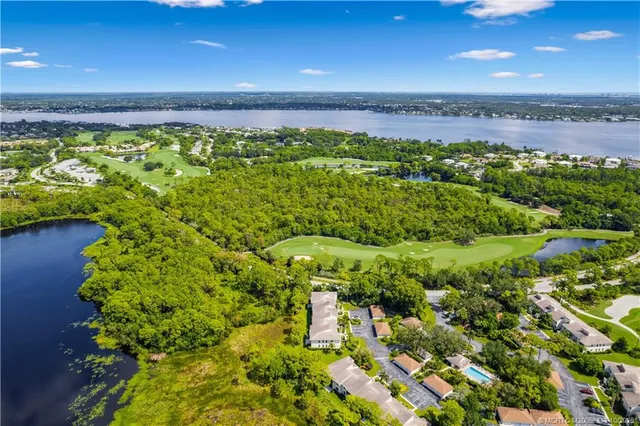 a view of a garage with a backyard