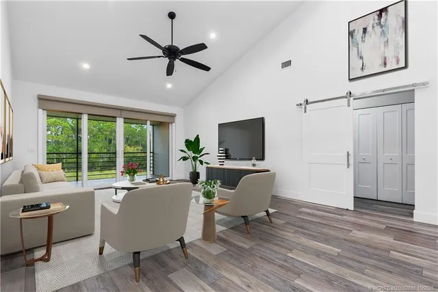 a living room with furniture and a window