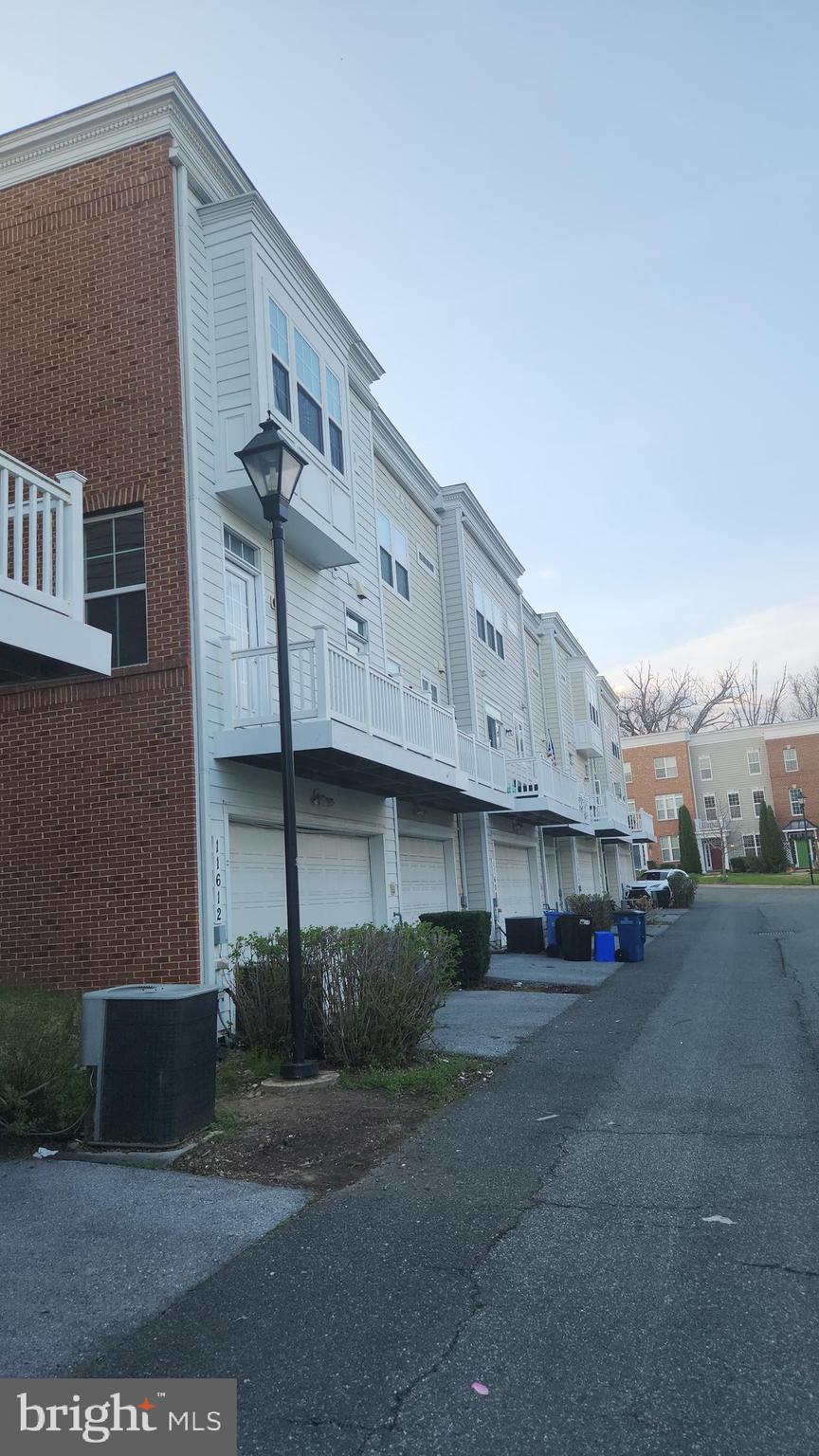 11612 Leesborough Circle Silver Spring, MD 20902 - Photo 2 of 29 a building view with a street