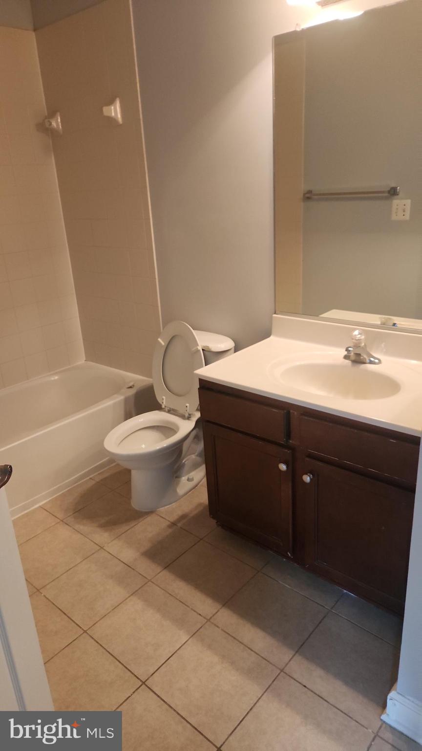 11612 Leesborough Circle Silver Spring, MD 20902 - Photo 26 of 29 a bathroom with a sink toilet and shower