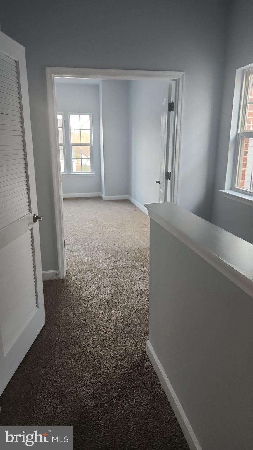 11612 Leesborough Circle Silver Spring, MD 20902 - Photo 28 of 29 a view of livingroom with hardwood floor and window