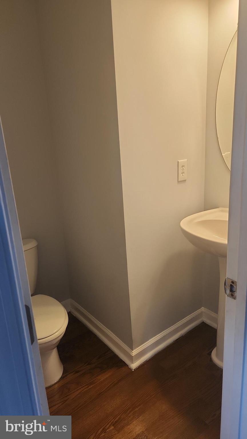 11612 Leesborough Circle Silver Spring, MD 20902 - Photo 9 of 29 a bathroom with a toilet and a sink