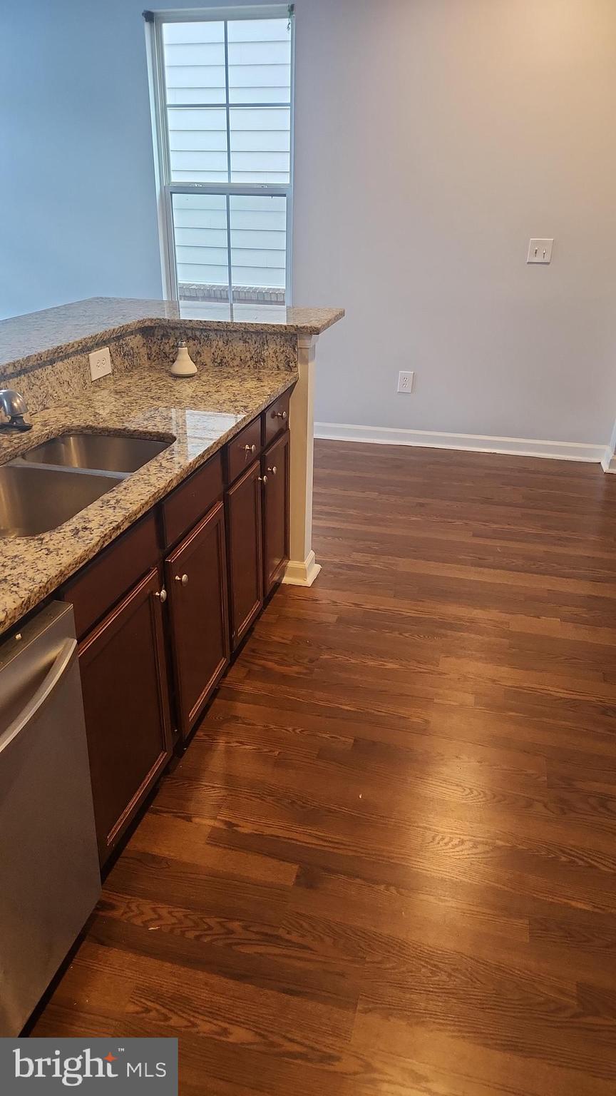 11612 Leesborough Circle Silver Spring, MD 20902 - Photo 10 of 29 a view of a kitchen counter space and wooden floor