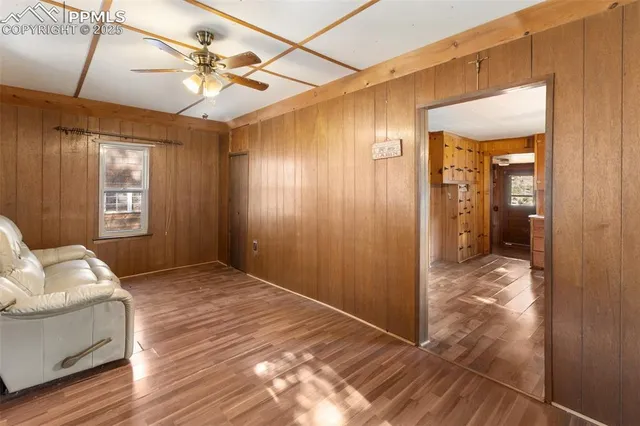 a view of livingroom with furniture and wooden floor