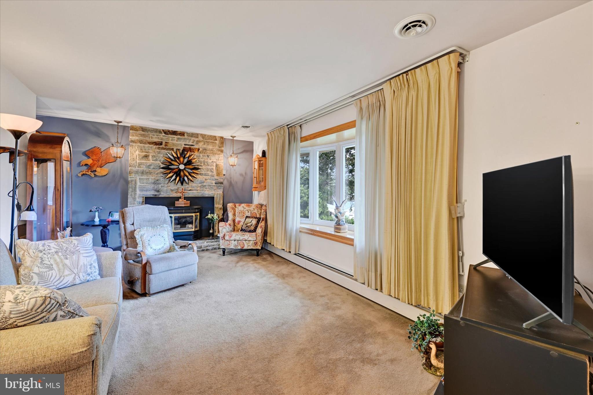 700 Remington Road Fallston, MD 21047 - Photo 13 of 42 a living room with furniture and a flat screen tv