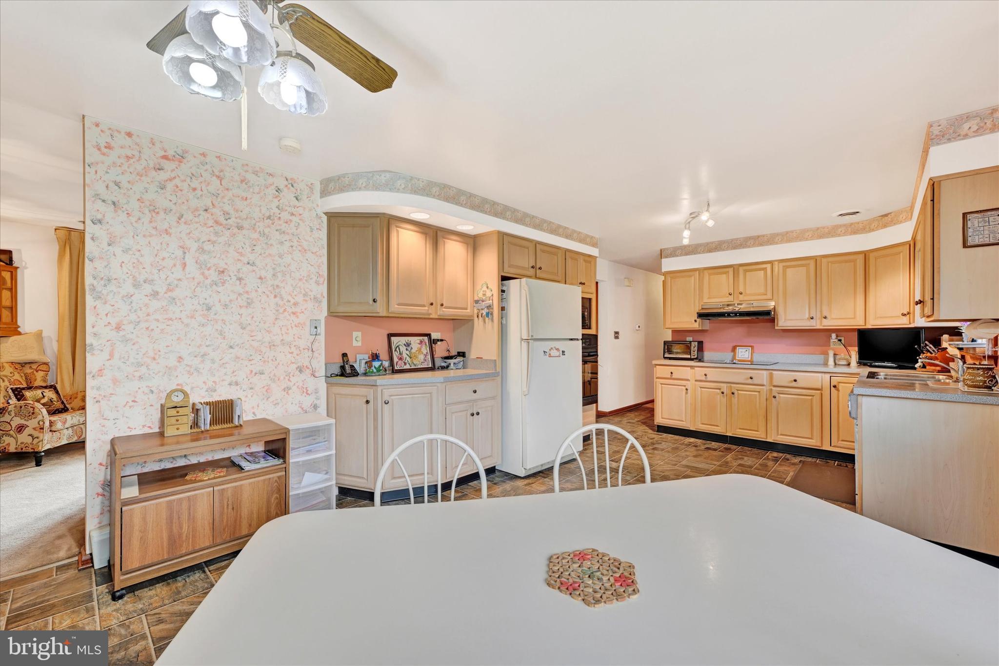 700 Remington Road Fallston, MD 21047 - Photo 16 of 42 a kitchen that has a lot of cabinets a sink and a stove