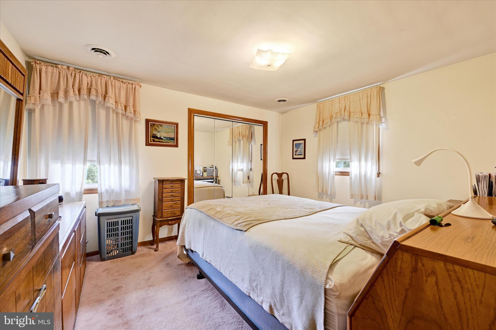 700 Remington Road Fallston, MD 21047 - Photo 17 of 42 a bedroom with a bed dresser and a window