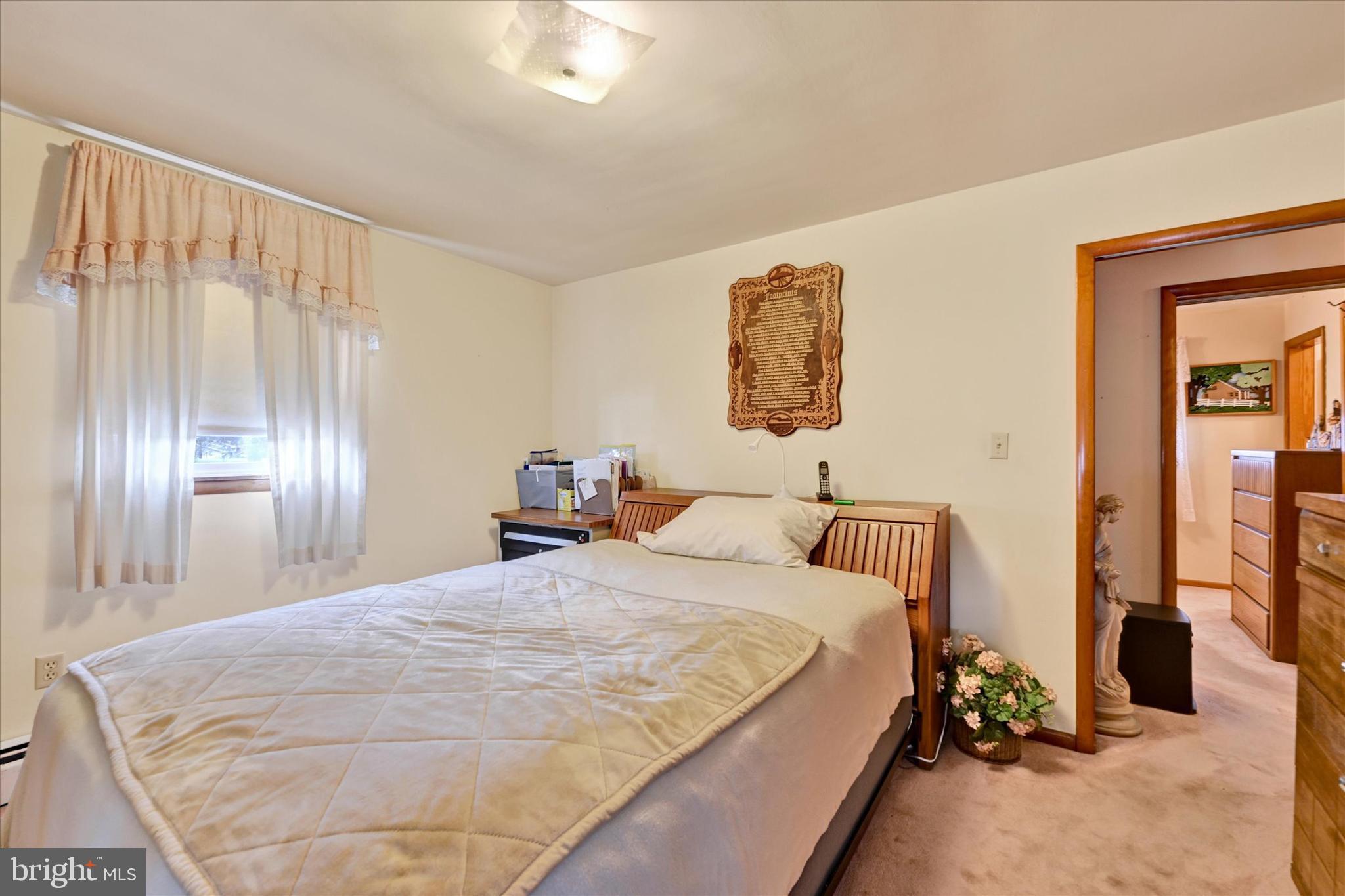 700 Remington Road Fallston, MD 21047 - Photo 18 of 42 a bedroom with a bed and a view of elevator