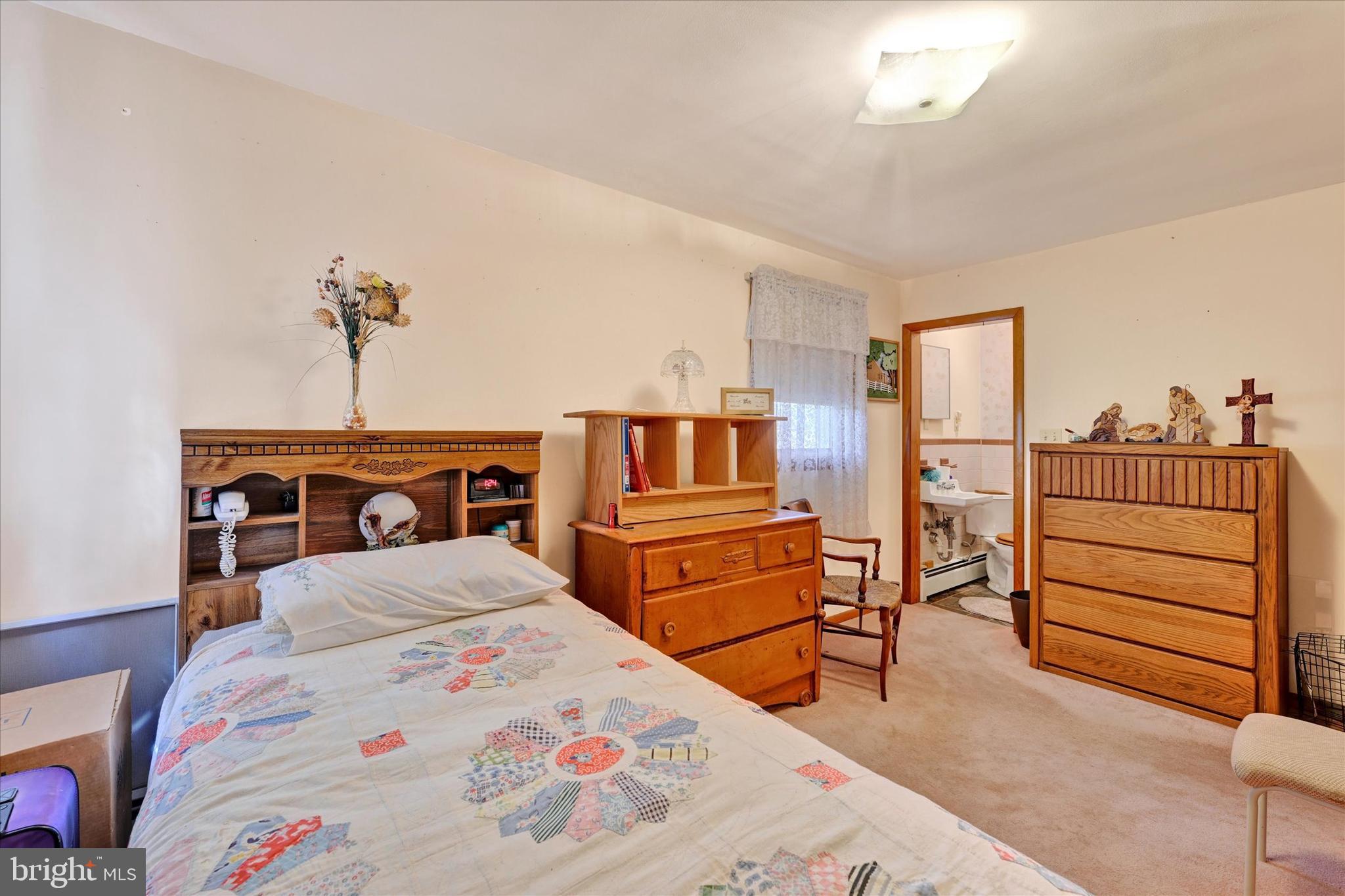 700 Remington Road Fallston, MD 21047 - Photo 20 of 42 a bedroom with a bed and cabinets