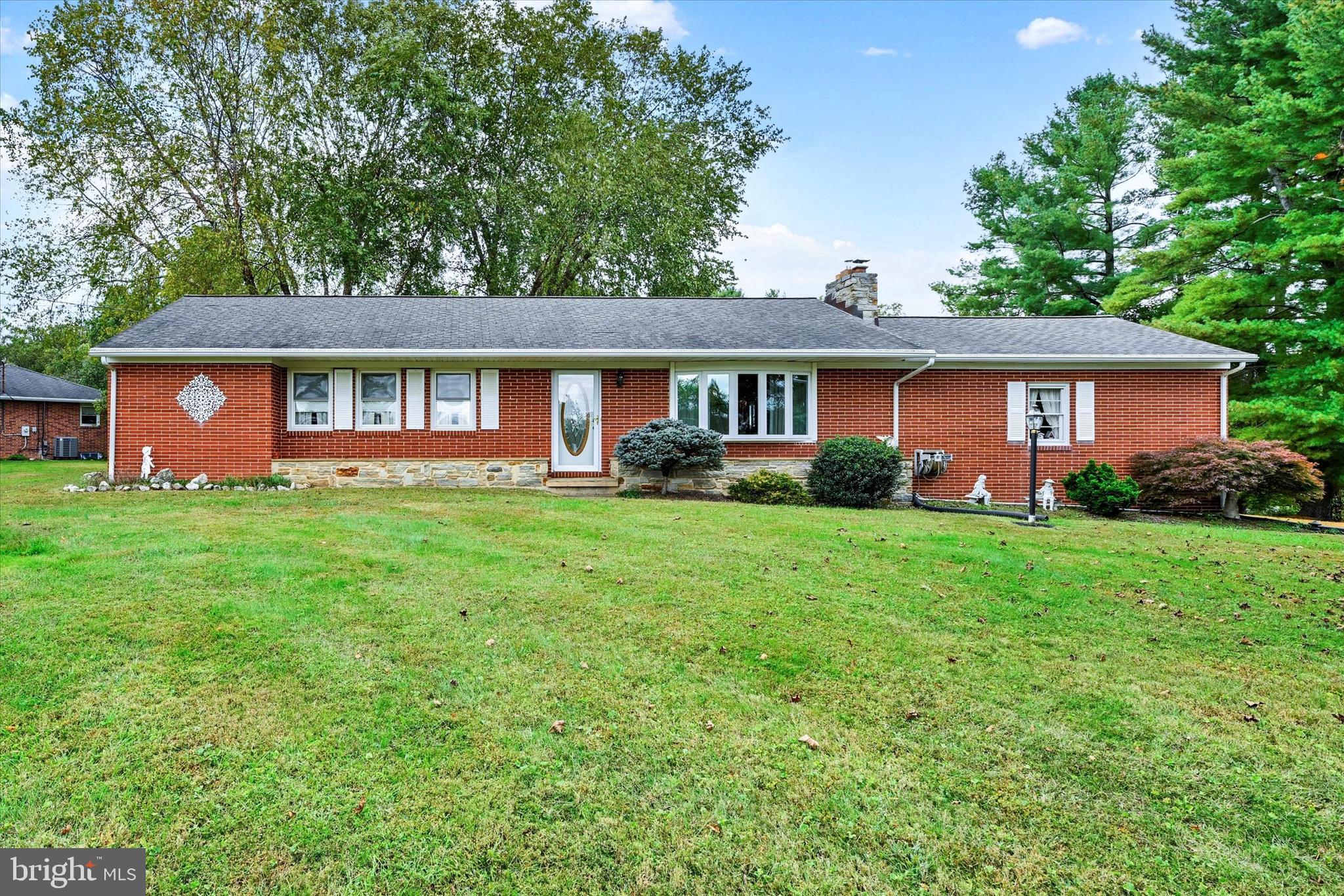 700 Remington Road Fallston, MD 21047 - Photo 2 of 42 a front view of a house with a yard and trees