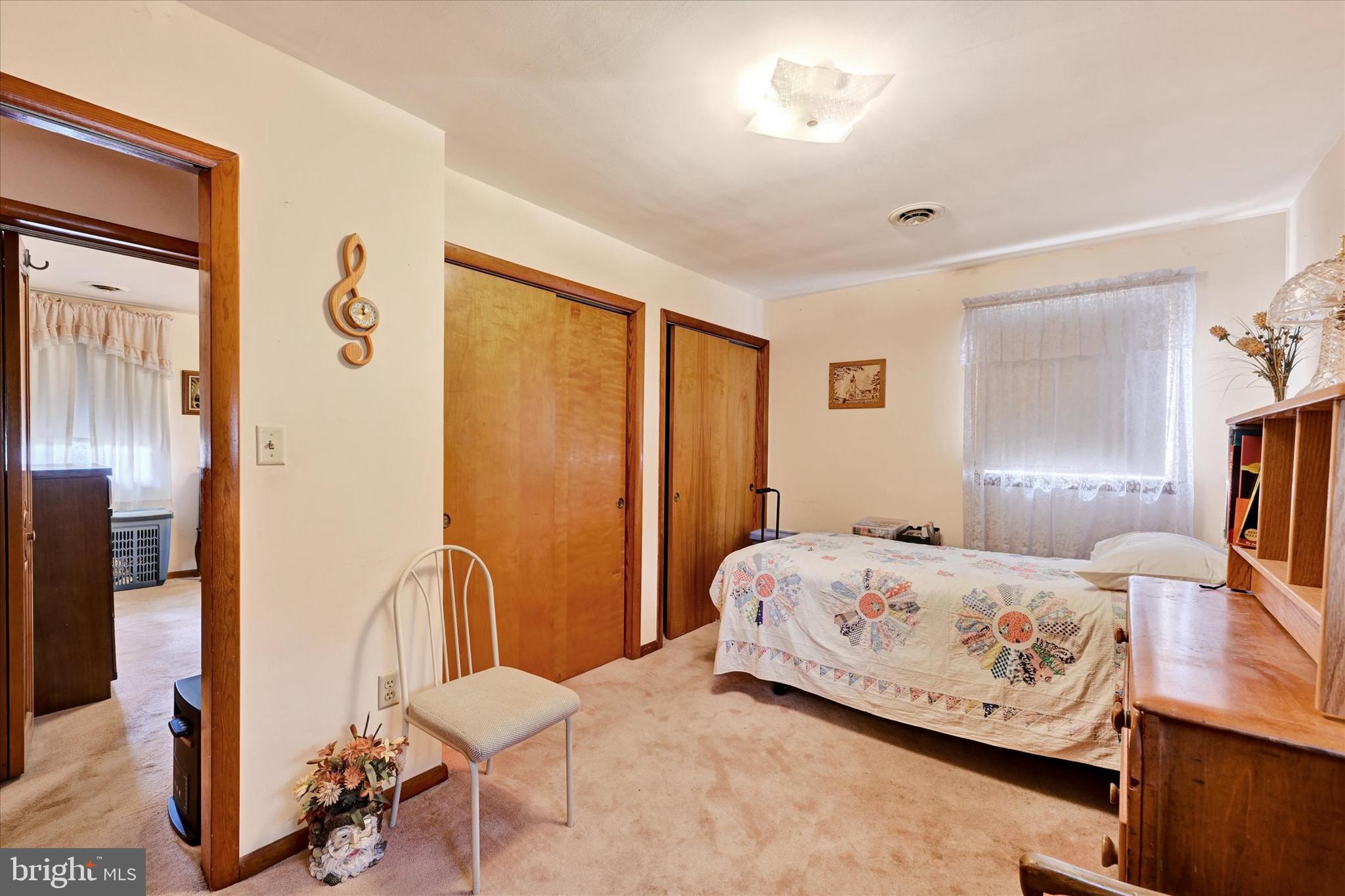 700 Remington Road Fallston, MD 21047 - Photo 21 of 42 a bedroom with a bed and wooden floor