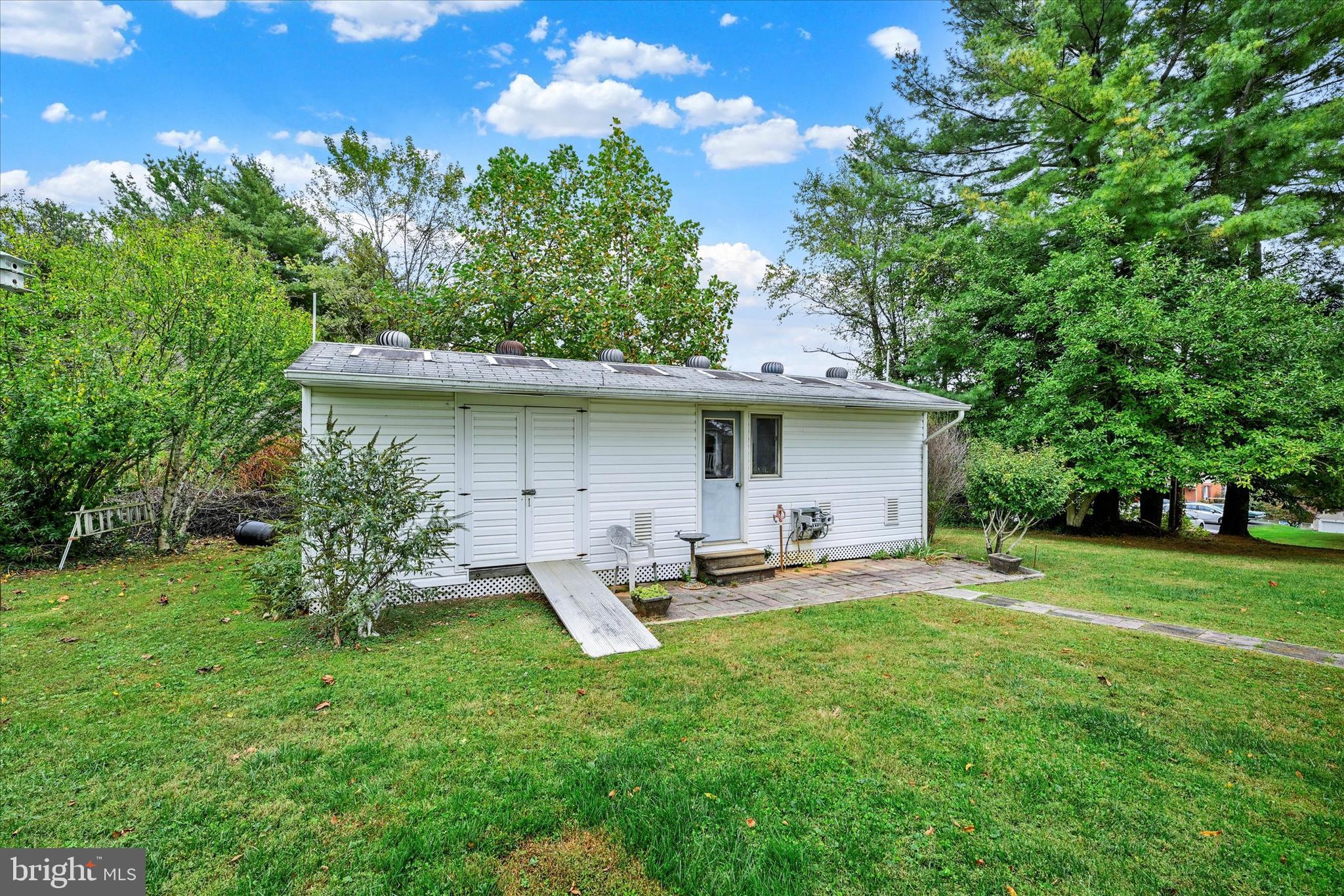 700 Remington Road Fallston, MD 21047 - Photo 35 of 42 a view of a house with a yard and sitting area