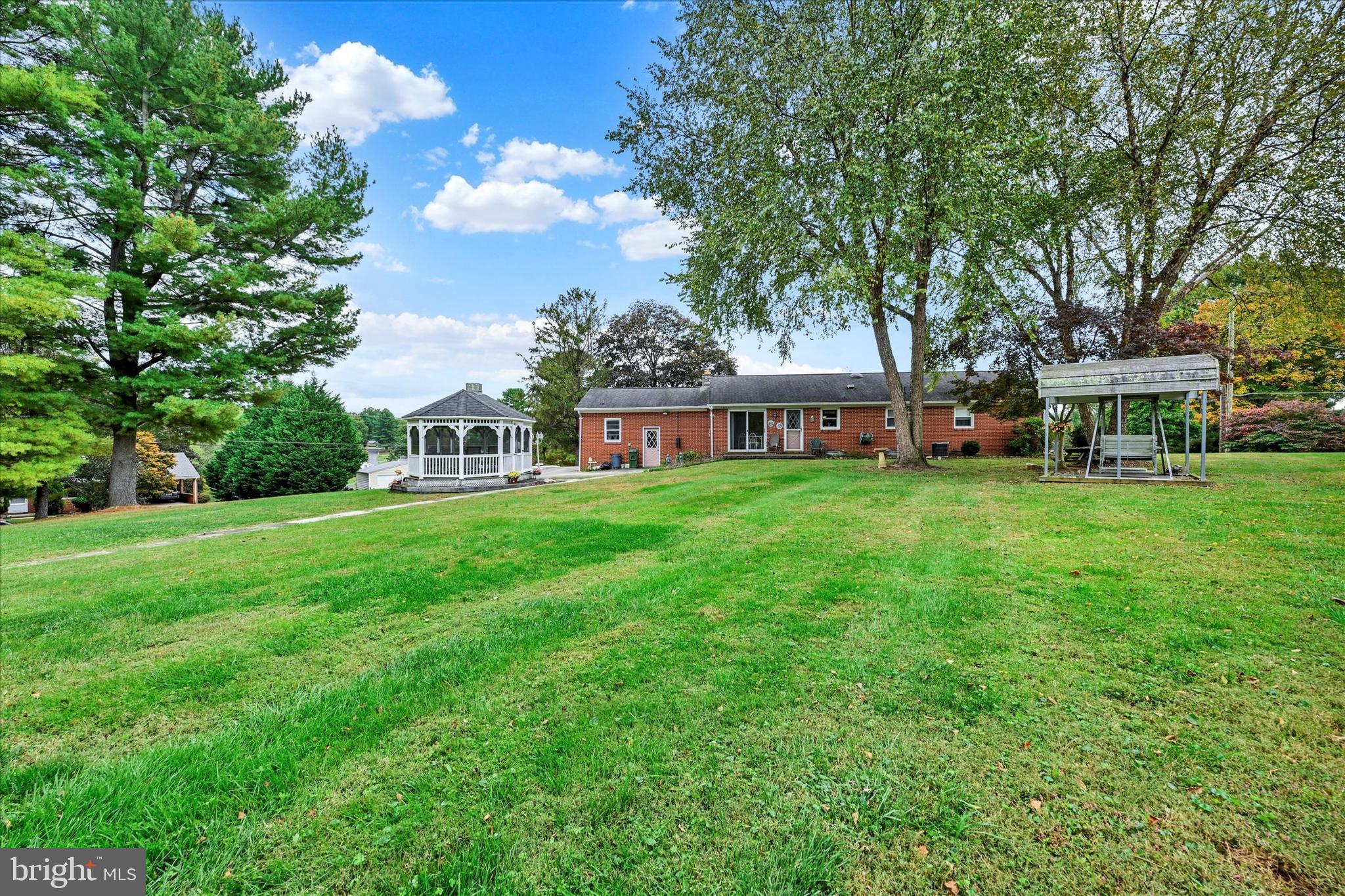 700 Remington Road Fallston, MD 21047 - Photo 38 of 42 a view of a house with a big yard and large trees