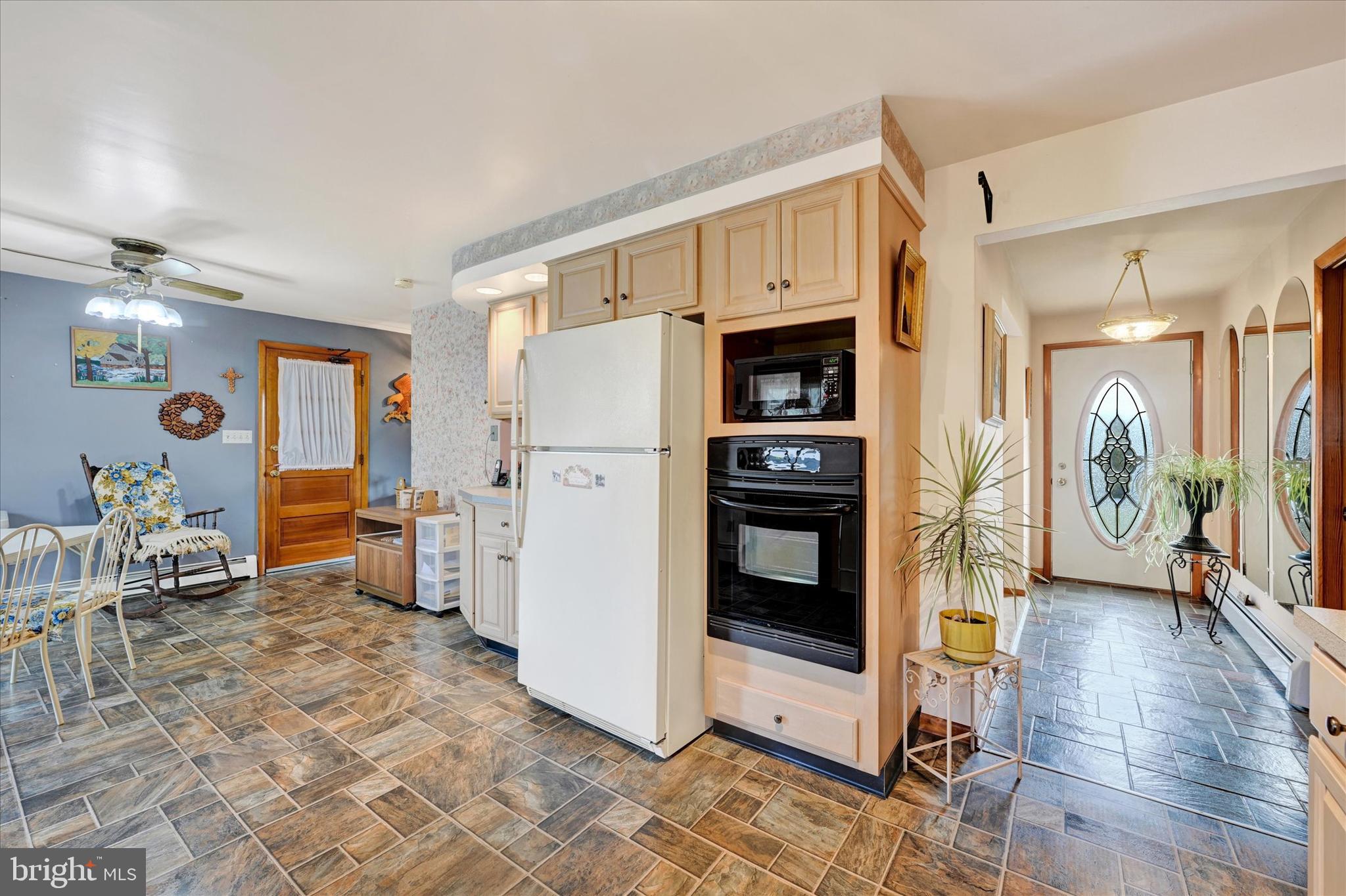 700 Remington Road Fallston, MD 21047 - Photo 7 of 42 a kitchen with stainless steel appliances a refrigerator and a stove top oven